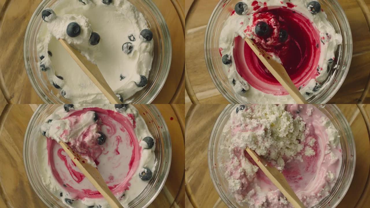 酸奶自制过程。制作新鲜的草莓和蓝莓甜点。滚动木板。延时拍摄。准备早餐。混合乳制品。用相机镜头移动勺子