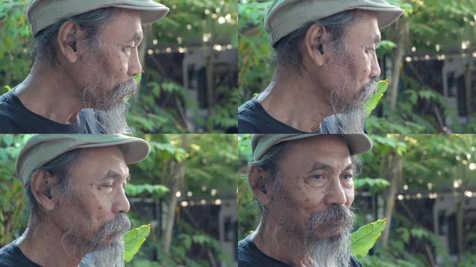 肖像亚洲活跃的老人在家里感觉很开心。早上在家的老男性