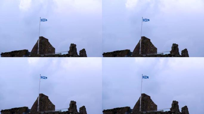 苏格兰Saltire旗高高飘扬在苏格兰历史城堡上