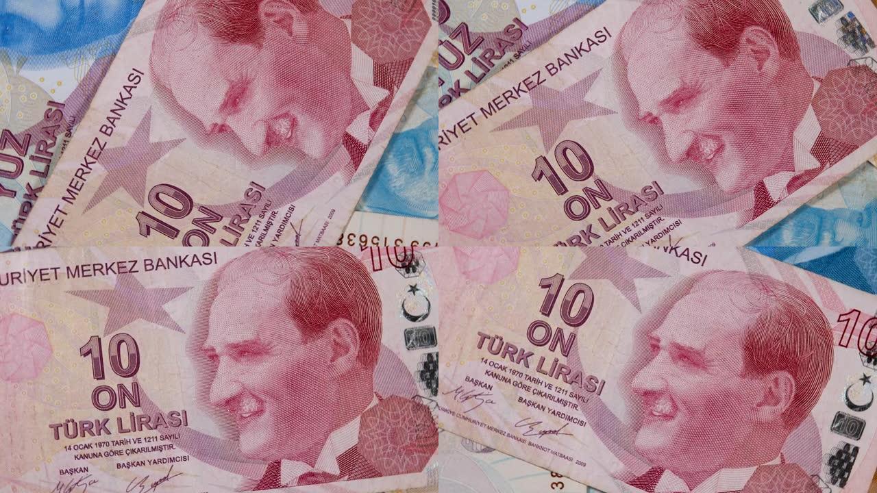 第一任总统穆斯塔法·凯末尔·阿塔图尔克在红色10土耳其里拉TRY钞票上的字母组合