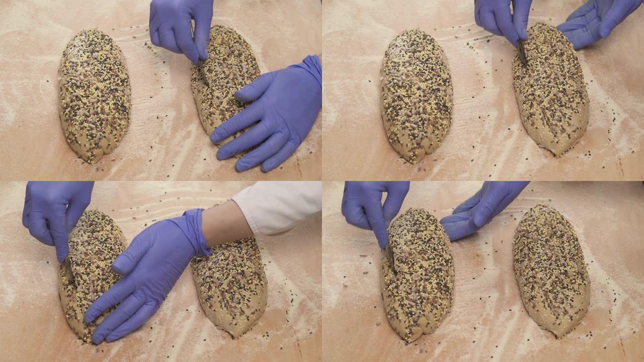 专业厨师用刀片砍面团的特写演示视频。给面团打分。专业面包面包店概念