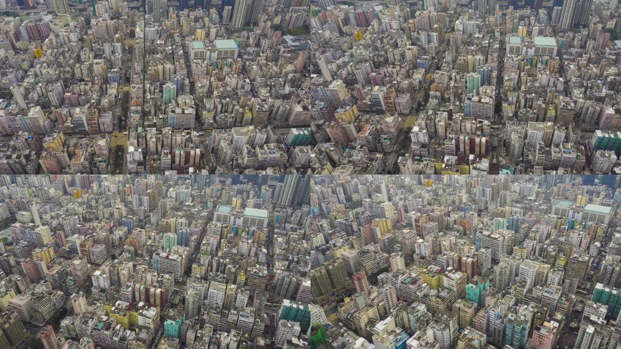 九龙岛香港住宅区交通和建筑的空中俯视日时间推移过度拍摄场景4k视频
