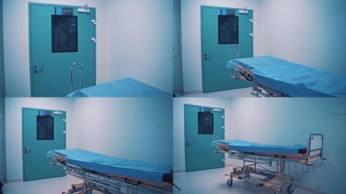 手术室的蓝色门和用于运送受伤患者的医疗车。