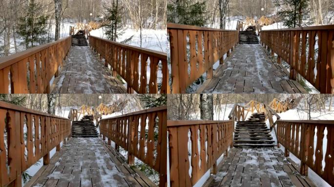 在峡谷上有楼梯的狭窄棕色木桥上的运动