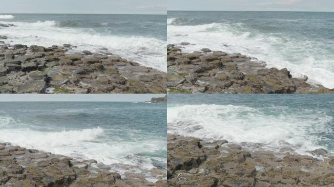 北爱尔兰巨人铜锣湾地区海岸线的海浪砸石