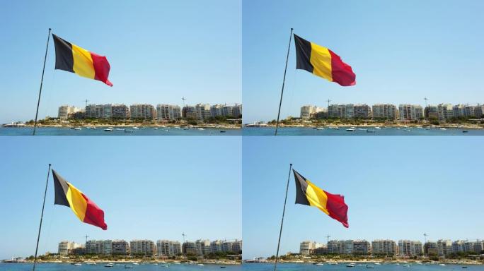 马耳他国的蓝天上悬挂着比利时国旗