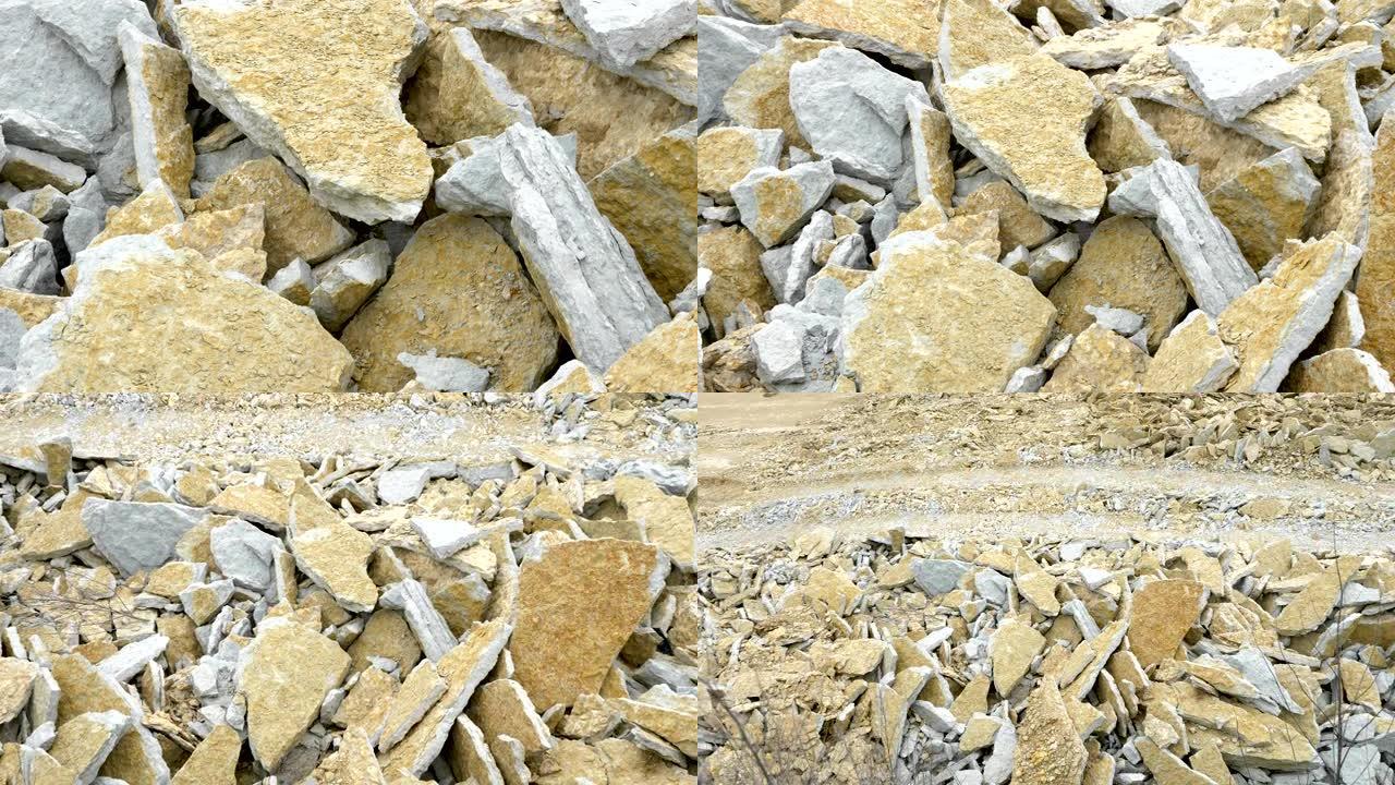 仔细观察地面上的岩石碎片