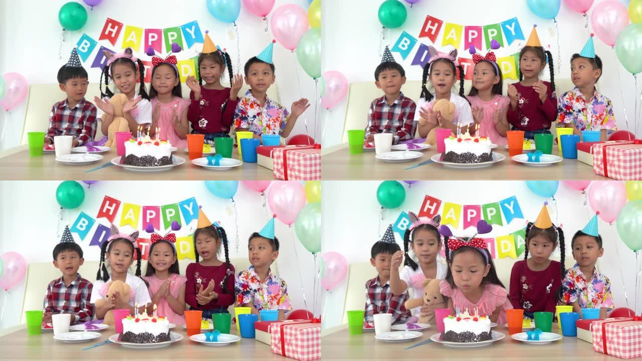 可爱的孩子生日派对，蛋糕在学校和朋友一起快乐