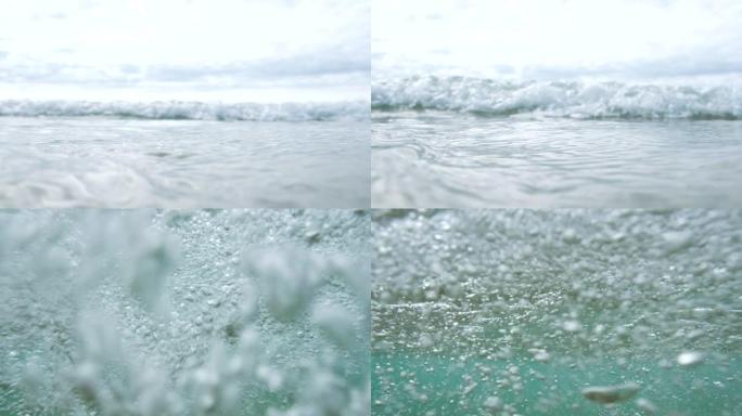 波浪冲向摄像机，越过摄像机顶部，康沃尔菲斯特拉尔海滩，5 X慢动作。