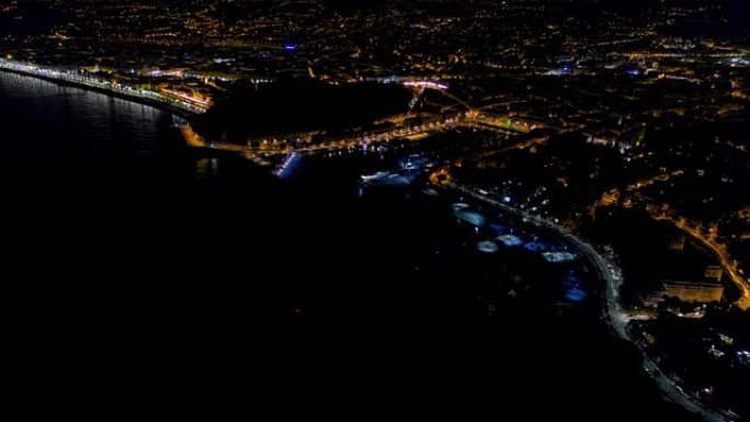 4k夜景鸟瞰图尼斯法国长廊、地中海和机场景观。法国城市夜景。夜城鸟瞰图。