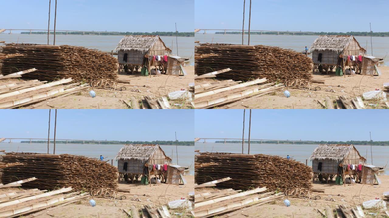 河边的小渔家，堆满了竹地板。费舍尔以钓鱼为背景
