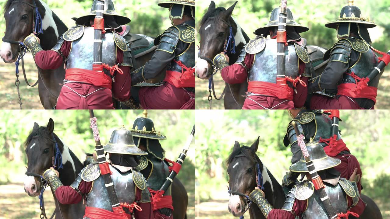 身穿古代盔甲的泰国士兵骑着马
