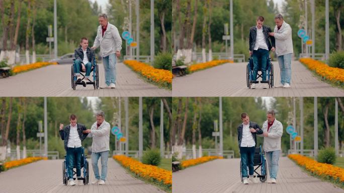 年轻人从轮椅上站起来走过去。父亲帮助儿子从轮椅上站起来走路。