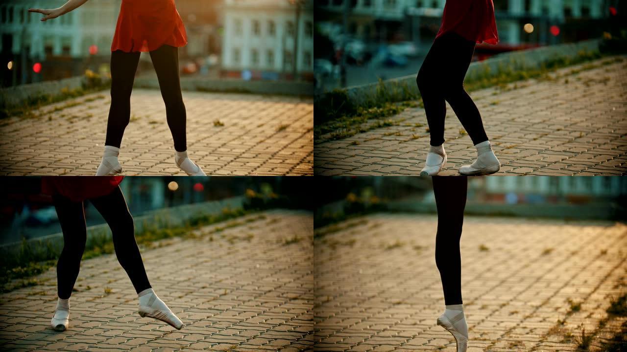 年轻的芭蕾舞女演员在屋顶上跳舞-tip脚走路-日落