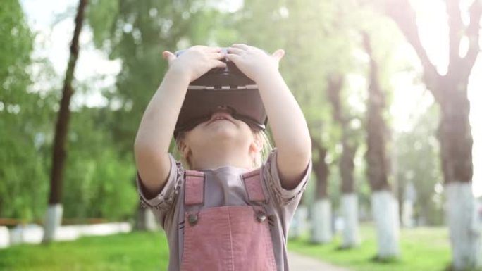 儿童戴着虚拟现实眼镜，户外充满乐趣和惊喜