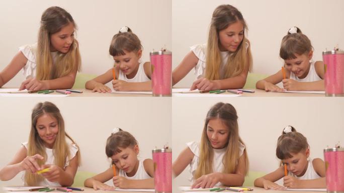 十几岁的女孩在心理会议上画画时和她的妹妹说话。家庭心理学