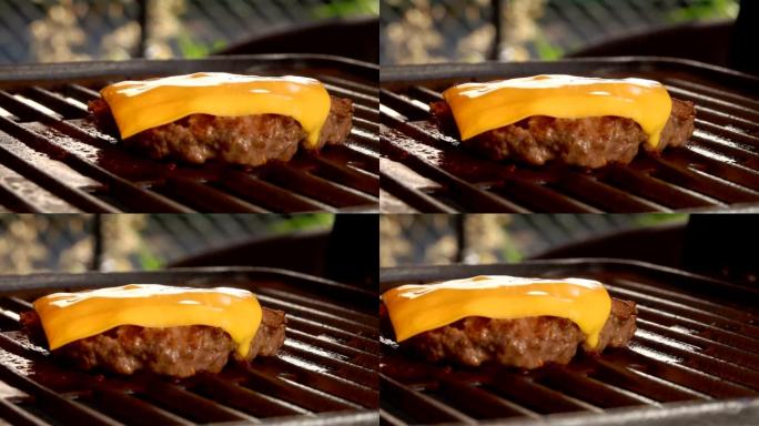 一块奶酪在热牛肉汉堡上融化
