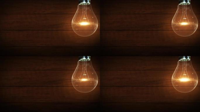 4k灯泡。木质背景。复古。理念创新和解决方案。创意概念