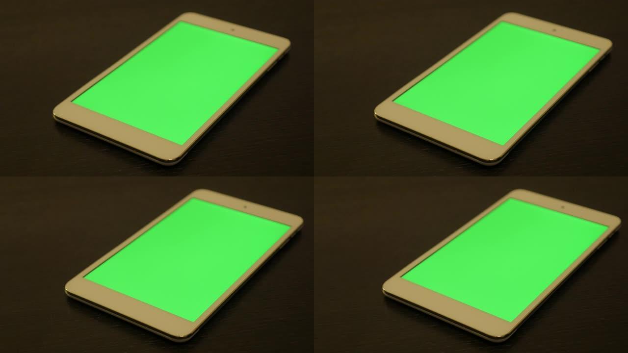 绿屏显示的平板电脑慢速平移4K