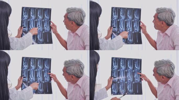 亚洲女性医疗由电影的x光照片在检查室给病人成像，高级亚洲男性由医疗专业人员接受健康检查，高级亚洲男性
