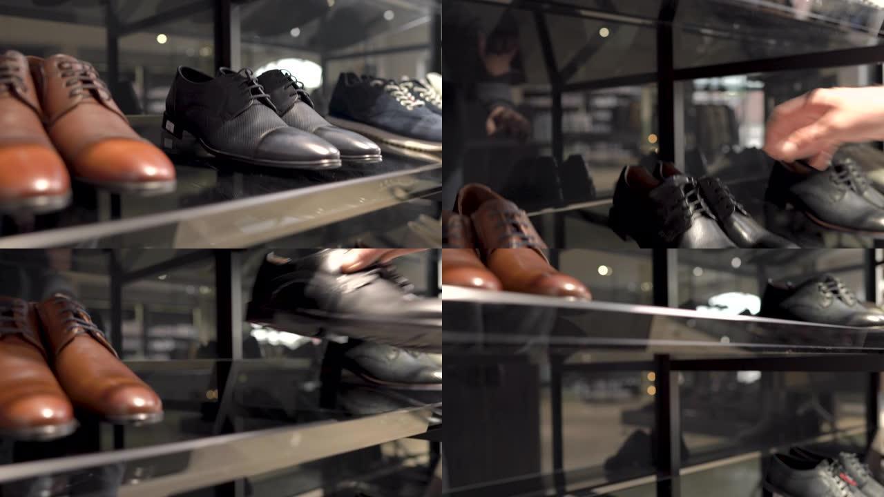 一位男性顾客在豪华商务时尚精品店中穿着经典风格的黑色皮鞋。顶部底部相机拍摄