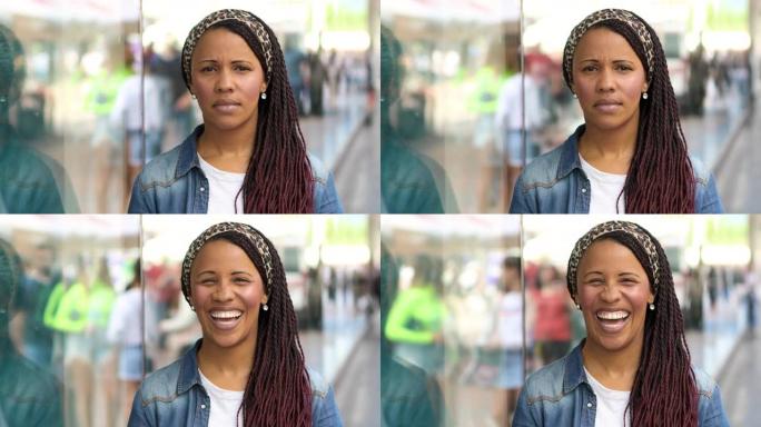 年轻美丽的非洲裔美国妇女看着相机微笑