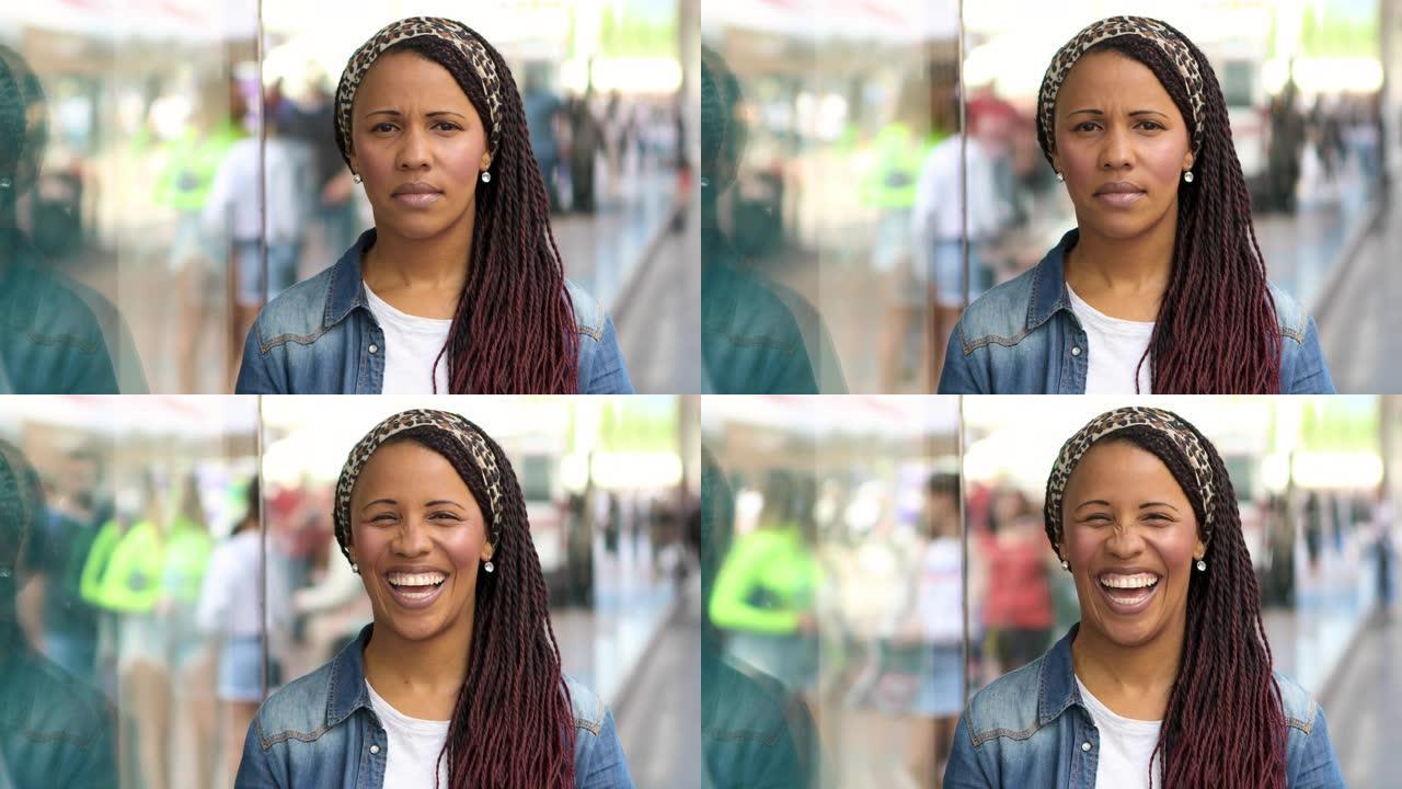 年轻美丽的非洲裔美国妇女看着相机微笑