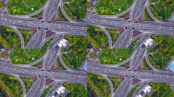 高速公路交叉口形状字母x十字的鸟瞰图。交通概念中的桥梁、道路或有树的街道。中国上海市城市建筑结构形状