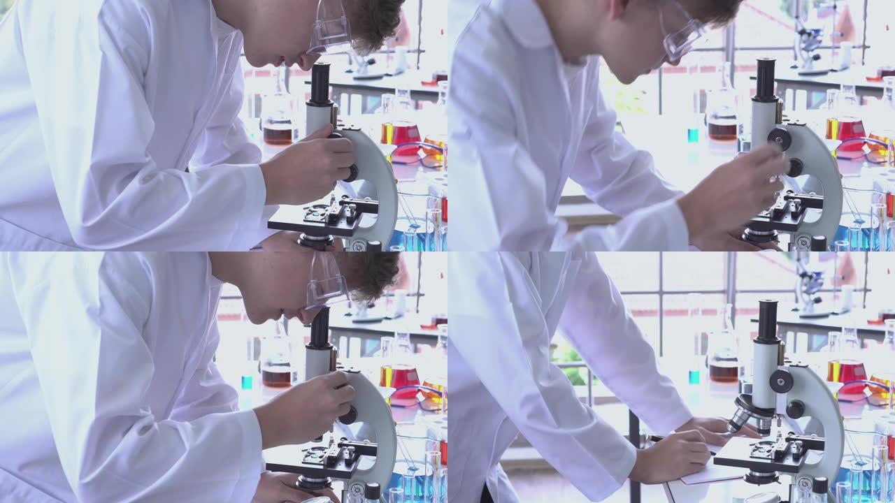 侧视图科学家男孩使用显微镜