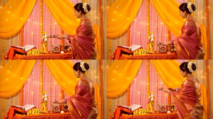 印度妇女表演Pooja，崇拜克里希纳勋爵-印度教的仪式和习俗