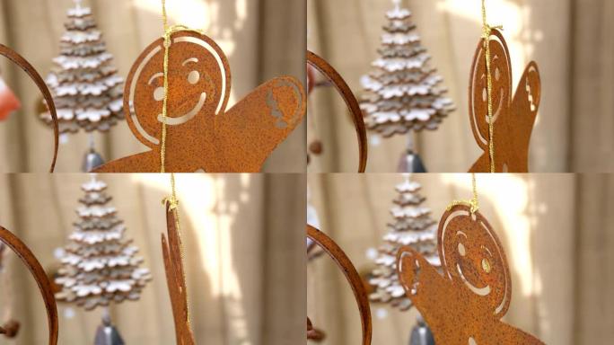 新年和圣诞节装饰，姜饼人生锈的铁质人物，在柜台上随风飘扬