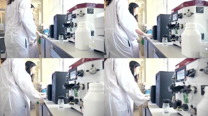两名科学家在实验室工作的场景慢动作使用蛋白质提纯机，概念科学与技术在实验室