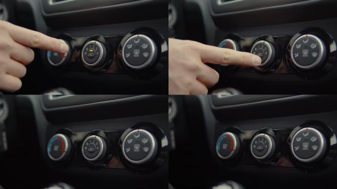 男人用按钮启动汽车。