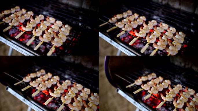 烤黄油虾串在炉子上