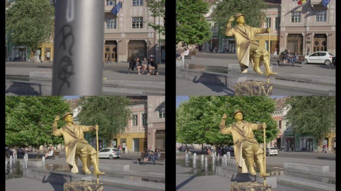广场上的金色生活雕像