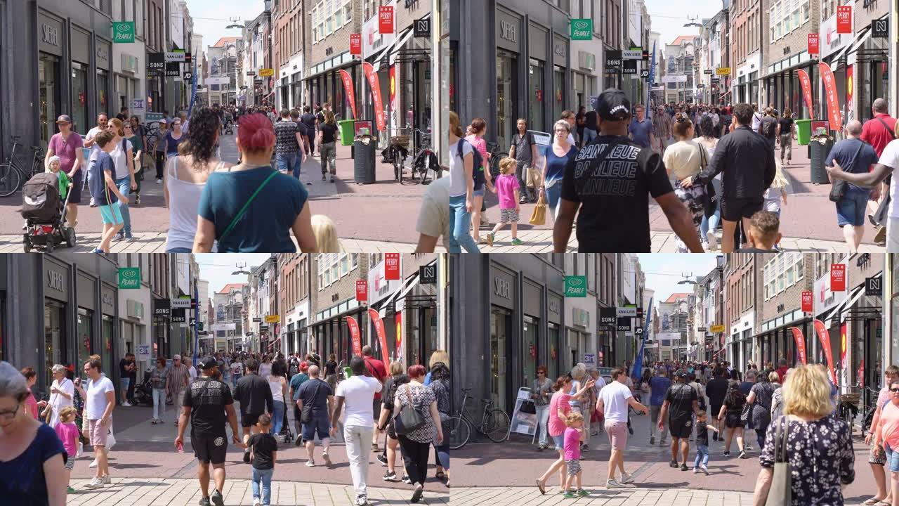 游客和当地人在2019年6月21日荷兰阿纳姆的市中心购物