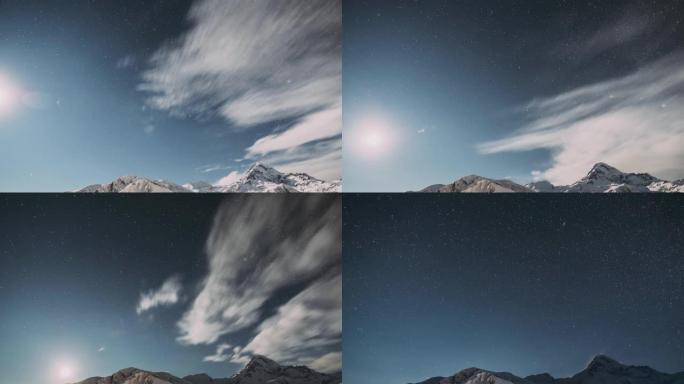 佐治亚州斯蒂芬斯明达。冬夜繁星点点的天空，星星发光，卡兹别克山的山峰被雪覆盖。美丽的夜晚格鲁吉亚冬季