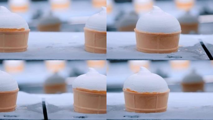 自动化技术概念-食品厂带冰淇淋锥体的传送带