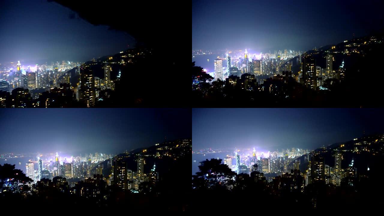 香港岛夜景天际线-几乎没有人居住的山丘和非常密集的摩天大楼充满了中心