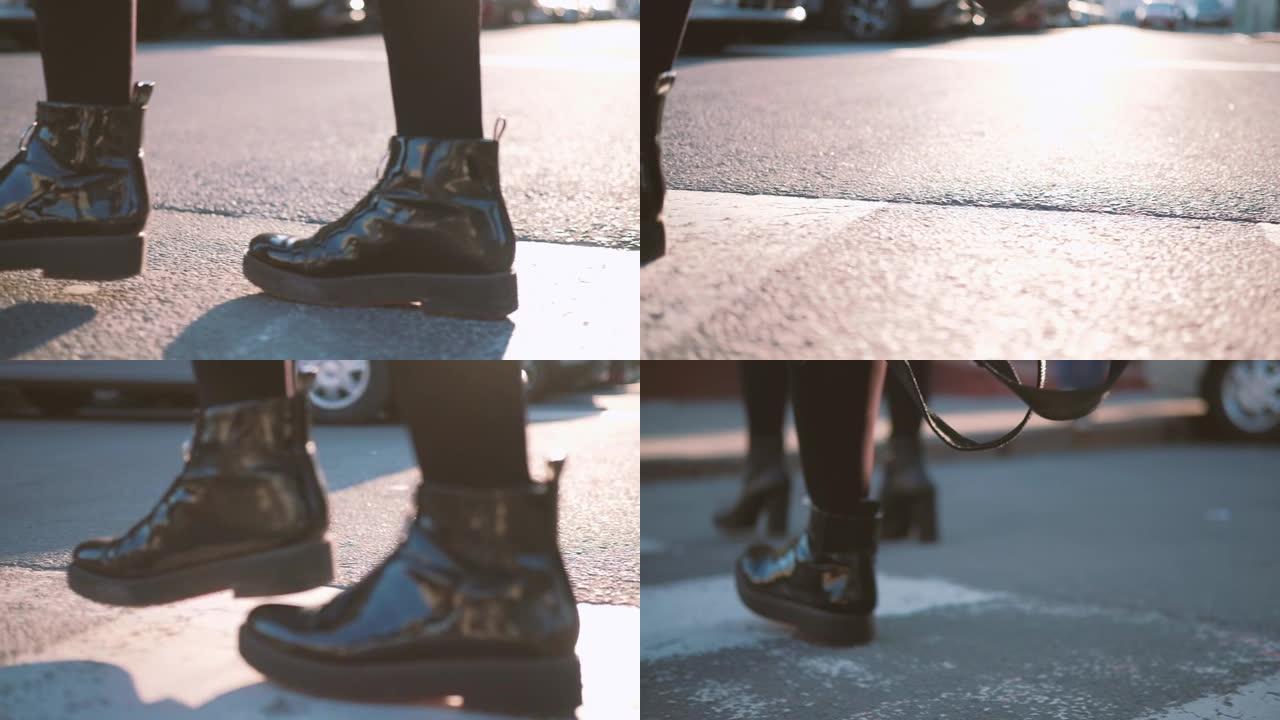 女人过街人行横道黑色漆靴