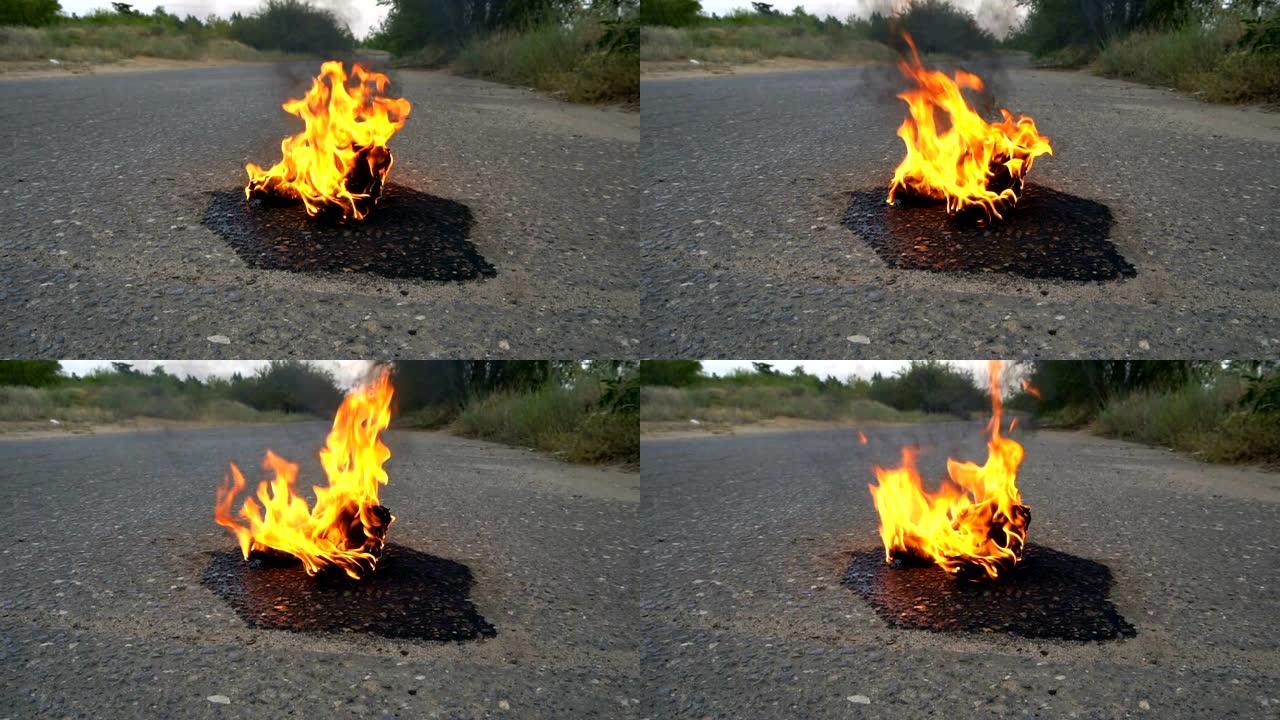 一双女鞋在空旷的道路上着火