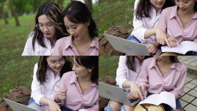 台湾女学生在公共公园使用笔记本电脑