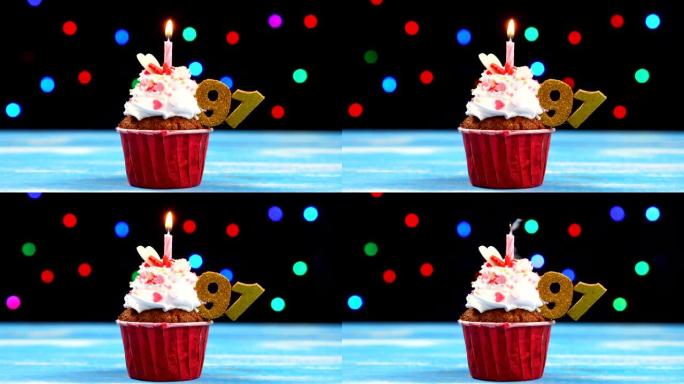 美味的生日蛋糕，蜡烛燃烧，彩色模糊灯光背景上有91号