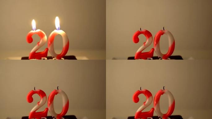 20岁生日蛋糕和吹蜡烛