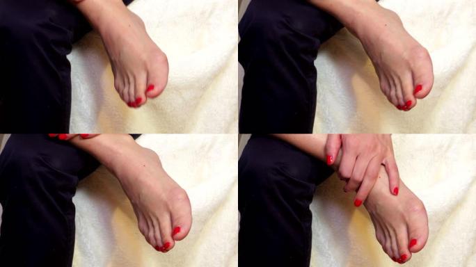 红色修指甲的女人的脚