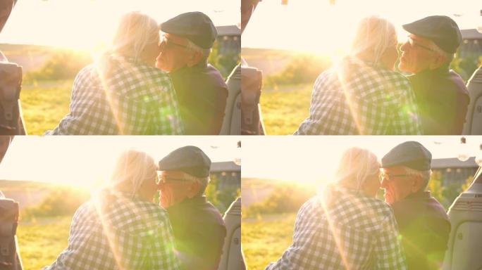 Happy traveler couple sitting in car open trunk an