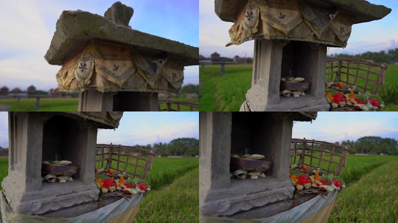 在巴厘岛的大稻田上拍摄小田庙或烈酒屋的慢镜头