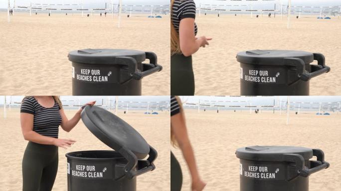 白人妇女在海滩上扔掉垃圾