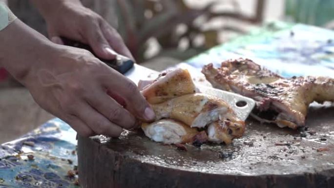 用油性皮肤不健康的食物切碎木块上的烤鸡