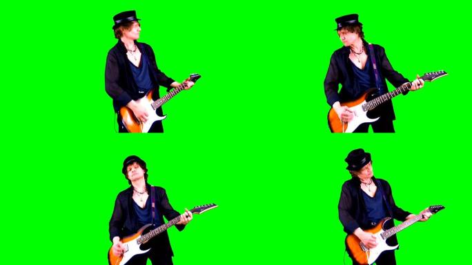 戴着帽子的酷摇滚吉他手在色键上弹奏电吉他。音乐家在绿色背景下表演。